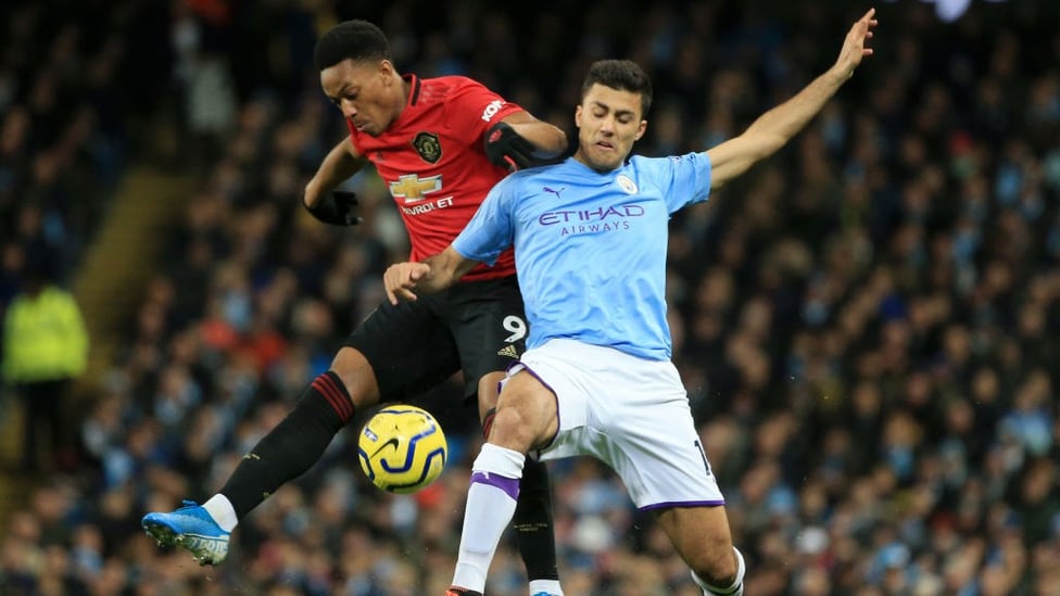 WELCOME : Rodrigo at full throttle in his first Manchester derby.