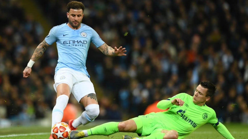 WALKER TALL : Kyle Walker does well to regain possession