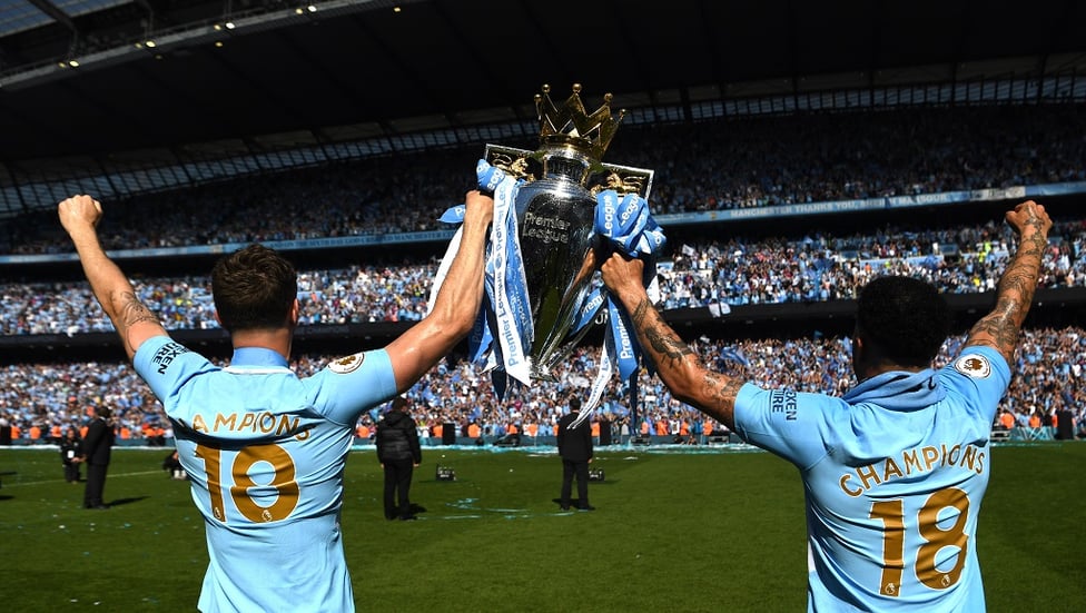 BROTHERS IN ARMS : Celebrating the title with pal John Stones