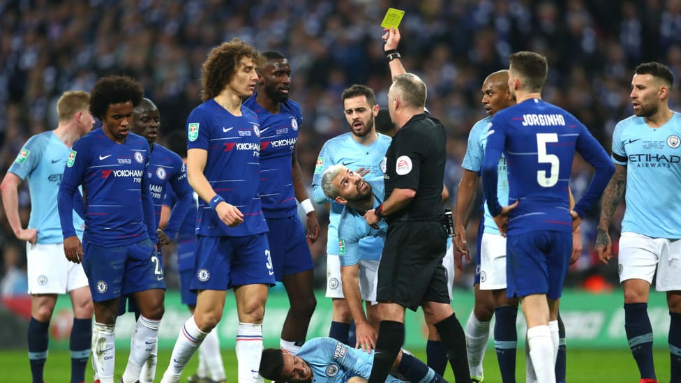 YELLOW FEVER : Antonio Rudiger is booked after bringing down David Silva