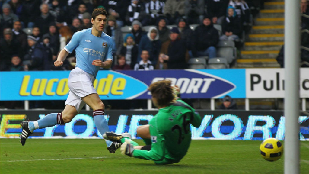 STRIKE ONE: Gareth Barry opens the scoring for City