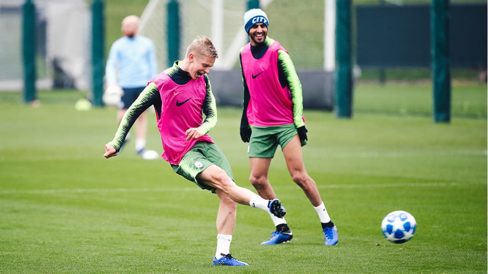 ON THE BALL : Riyad Mahrez looks on as Oleksandr Zinchenko fires out a pass