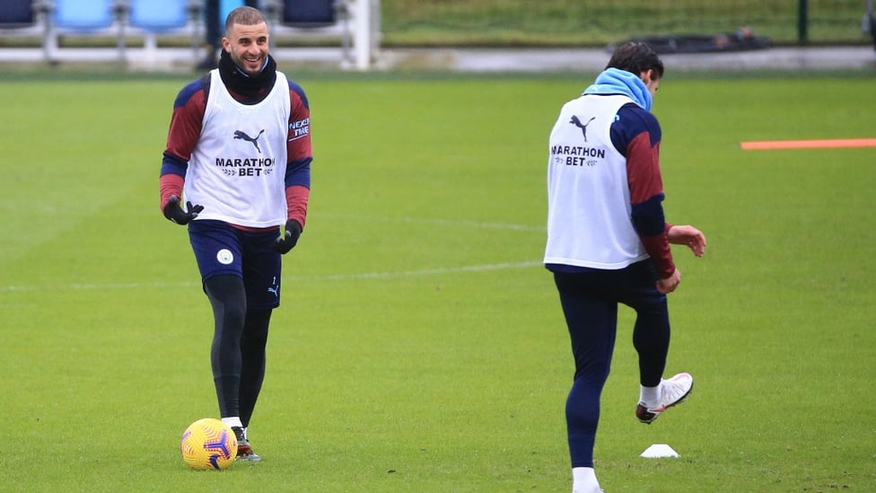 DEFENSIVE DUO : Ruben Dias appeared to have amused Kyle Walker!