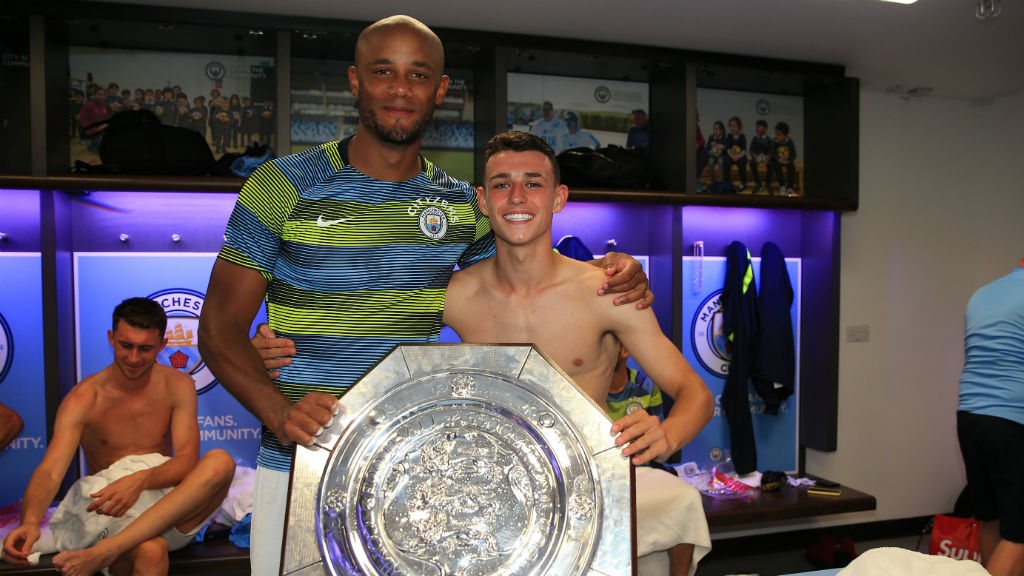 EXPERIENCE AND YOUTH: Vincent Kompany and Phil Foden