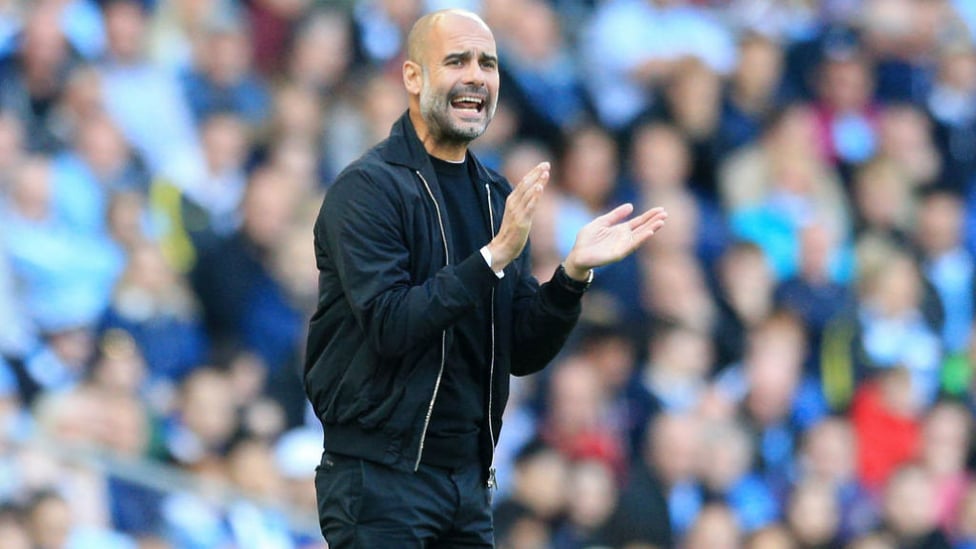 CLAP YOUR HANDS : Pep tries to get his team going from the sidelines