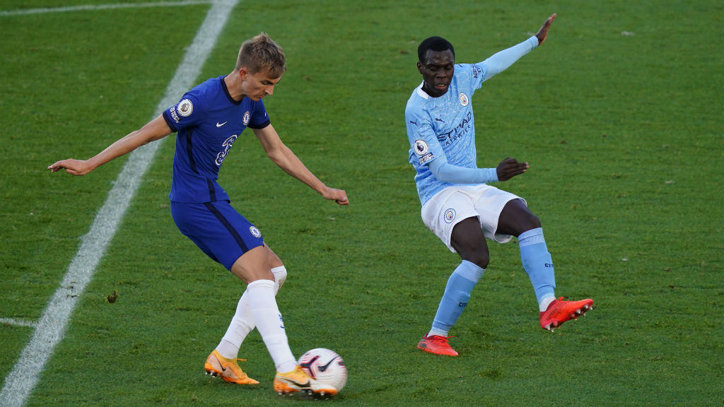 NO ENTRY: Claudio Gomes puts the squeeze on Chelsea 