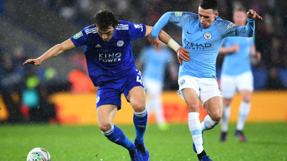 UP FOR THE CUP : Phil Foden battles to try and regain possession