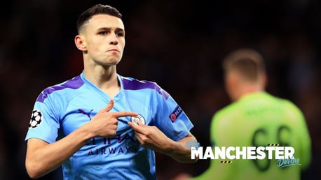 FAN: Phil Foden points to the badge of the Club he loves.