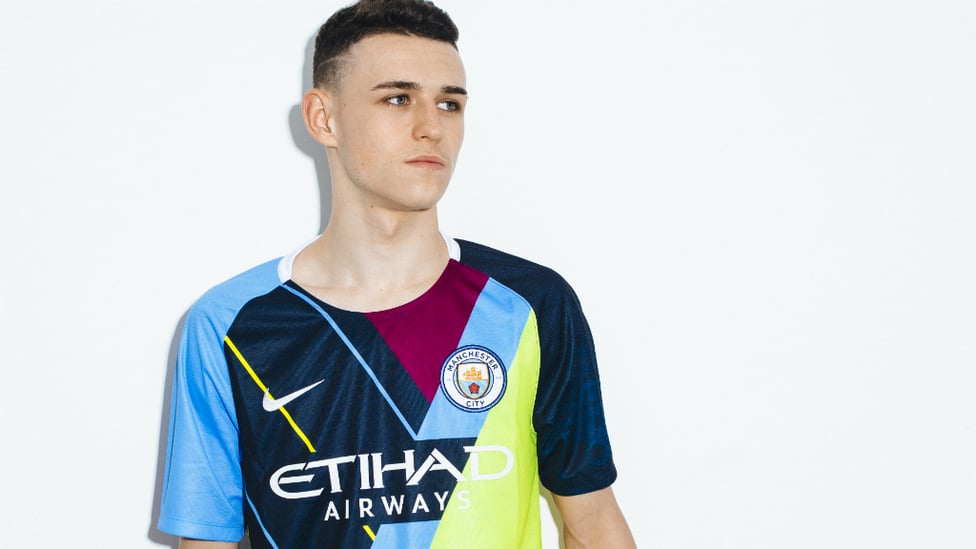 BRIGHT YOUNG THING : Phil Foden proudly sports our celebration mashup shirt