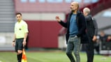 THE BOSS: Pep Guardiola gets his point across to the City players