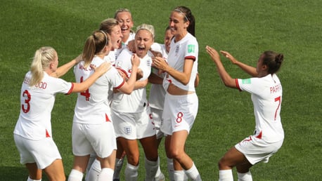 CAPTAIN FANTASTIC: Steph Houghton celebrates with her team-mates after firing England ahead