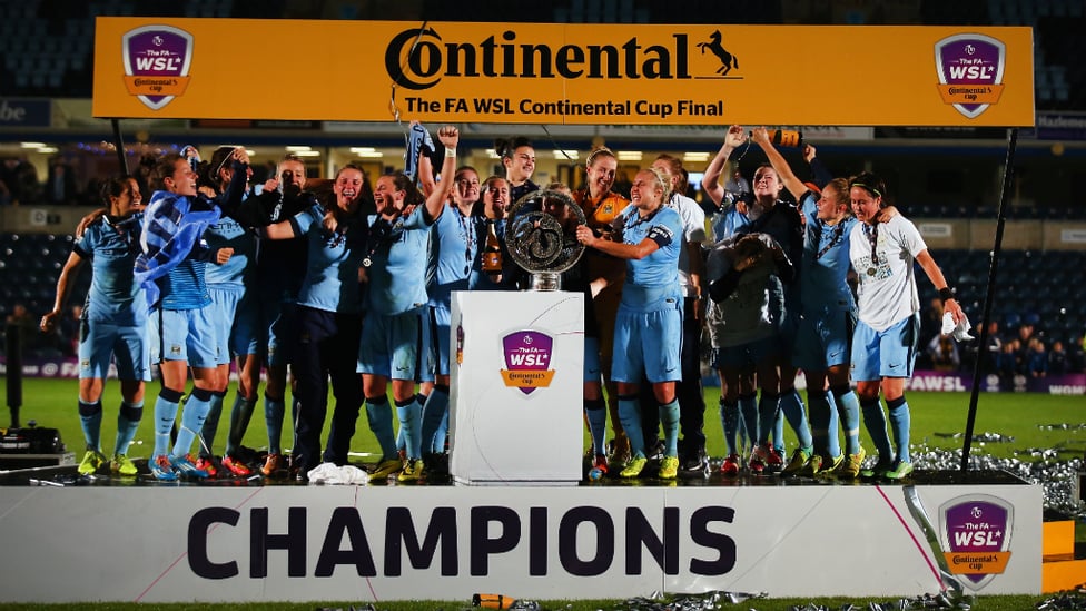 PERFECT START : Celebrating our first piece of major silverware - the Continental Tyres Cup - in our first season in the top-flight