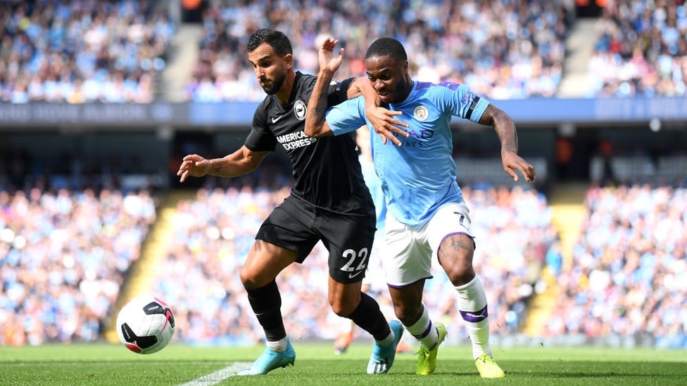 PROBING : Raheem Sterling races down the left flank.