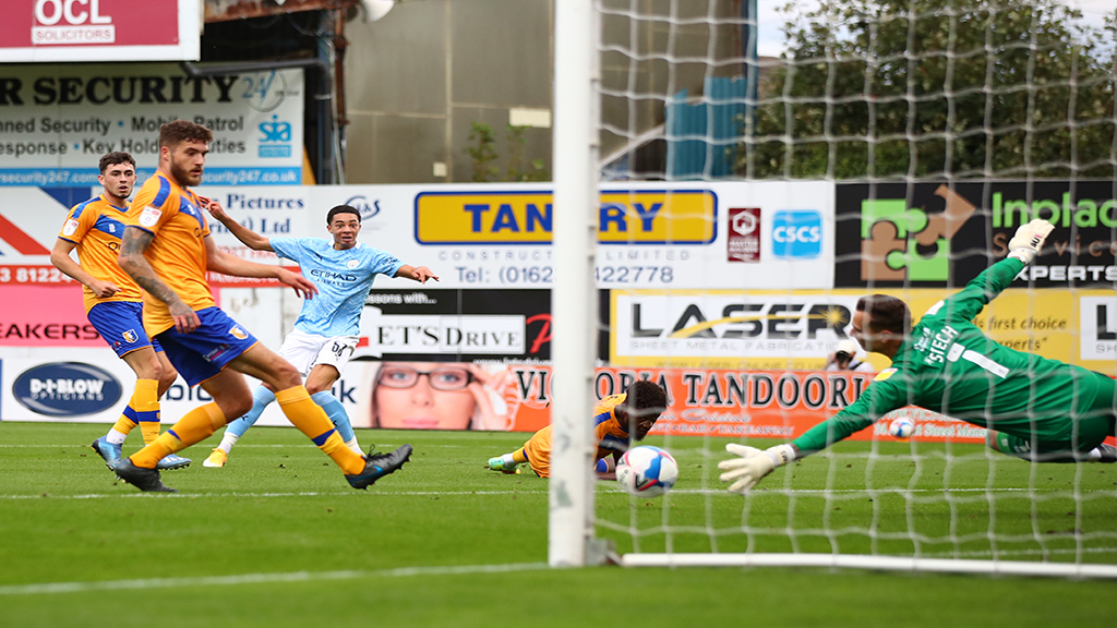 SO CLOSE: Sam Edozie is denied by the Mansfield keeper