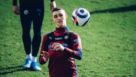 FODEN FOCUS: Phil Foden keeps his eye on the ball