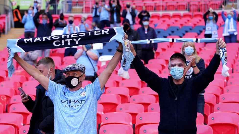 WELCOME BACK:  : City fans make themselves heard as the turnstiles open for 8,000 supporters again after over a year.