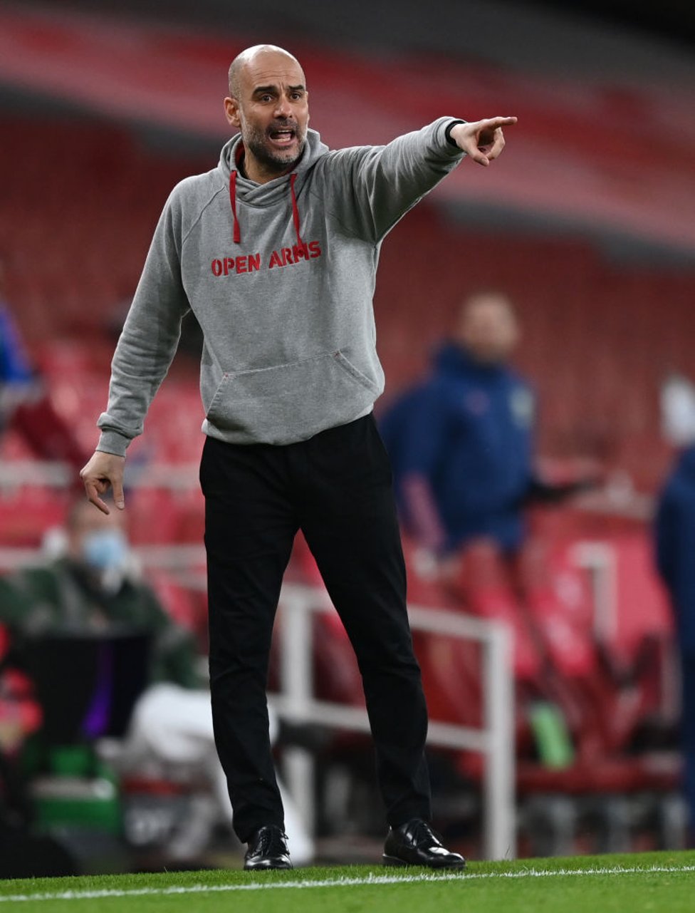 PEP TALK : The boss provides some instructions from the touchline with 15 minutes remaining.