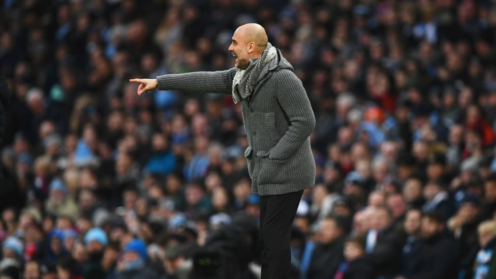 MASTER AT WORK : Pep Guardiola dishes out the orders.