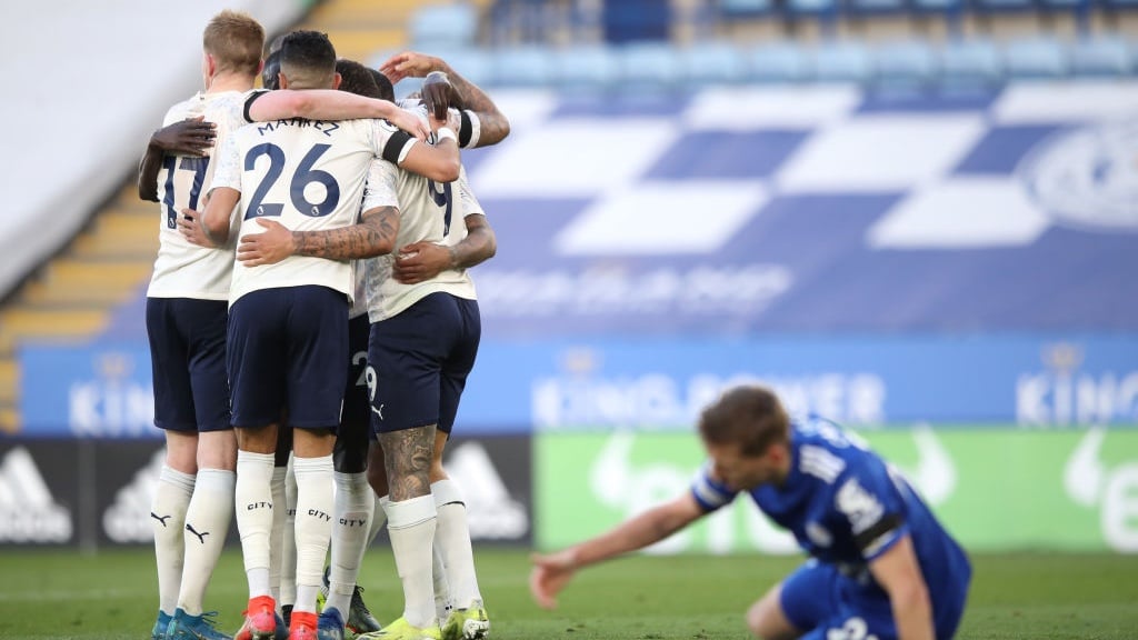 GROUP HUG: Jesus feeling the love after scoring the second goal of the game.