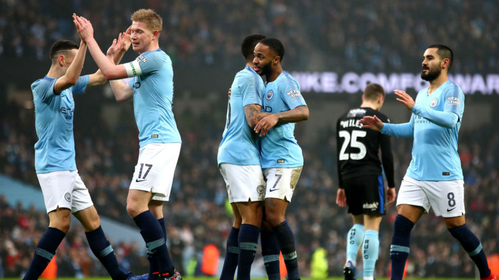 CELEBRATION TIME : The Blues are all smiles after Raheem Sterling's early strike
