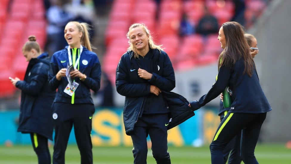 Nick Cushing's side share a laugh whilst inspecting the Wembley pitch