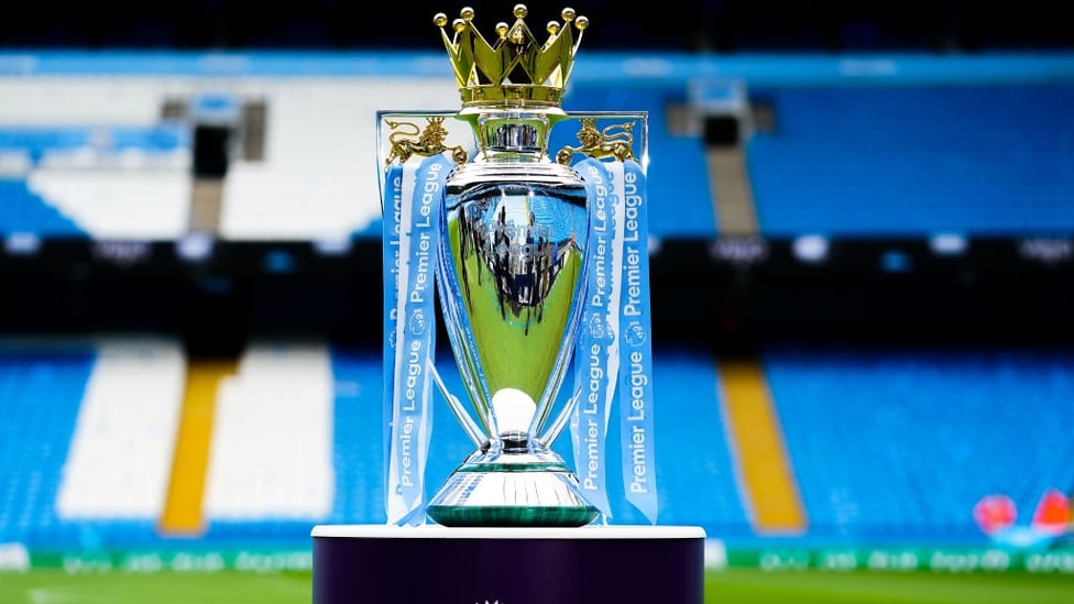 SPECIAL GUEST : The Premier League trophy arrives back home ahead of the clash with the Toffees.