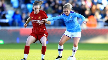 FAMILIAR FACE: Former Liverpool player, Laura Coombs, battles for the ball.