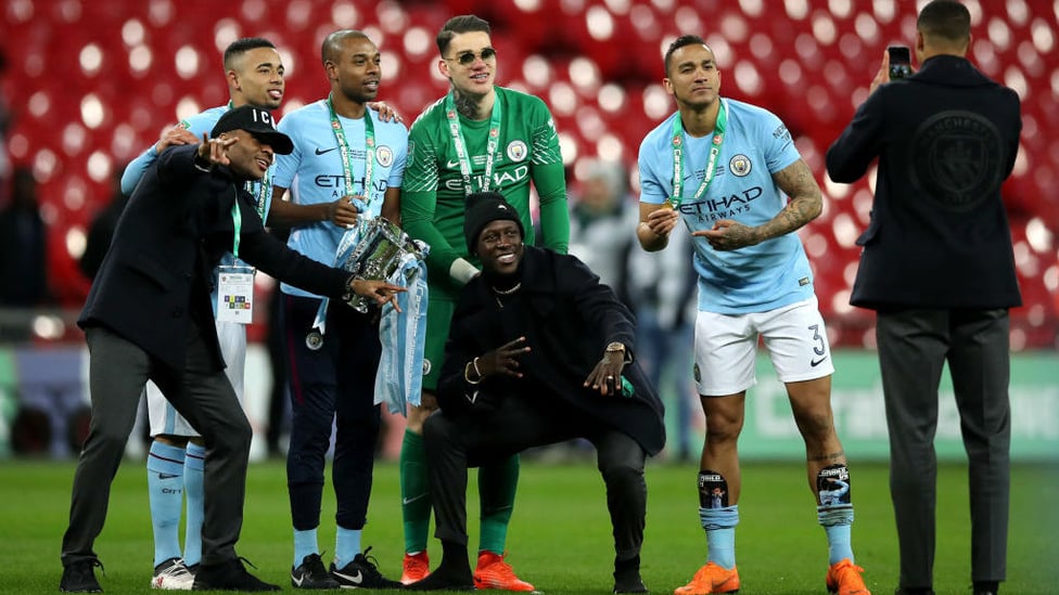 CARABAO CUP SUCCESS : Although he was injured for the final, Raheem poses with his teammates and the trophy.