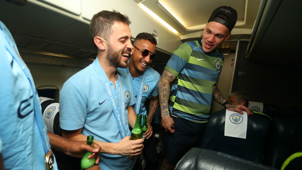 CABIN FEVER : Bernardo Silva, Danilo and Ederson just can't contain their joy