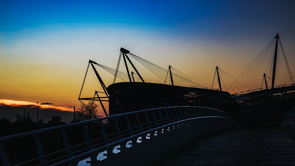 SUNSET SILHOUETTE: A wonderful backdrop frames the Etihad 