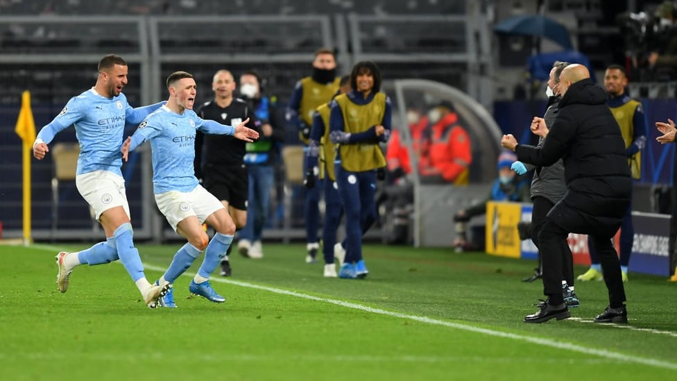 BOSSING IT: Foden runs straight to the boss after giving City the lead on the night