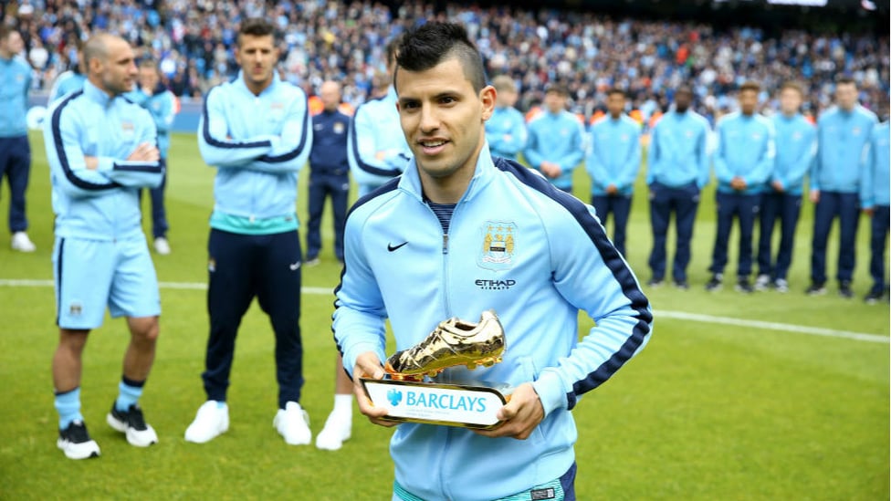 GOOD AS GOLD : Sergio displays the Premier League Golden Boot presented to him for finishing leading scorer in the 2014/15 season