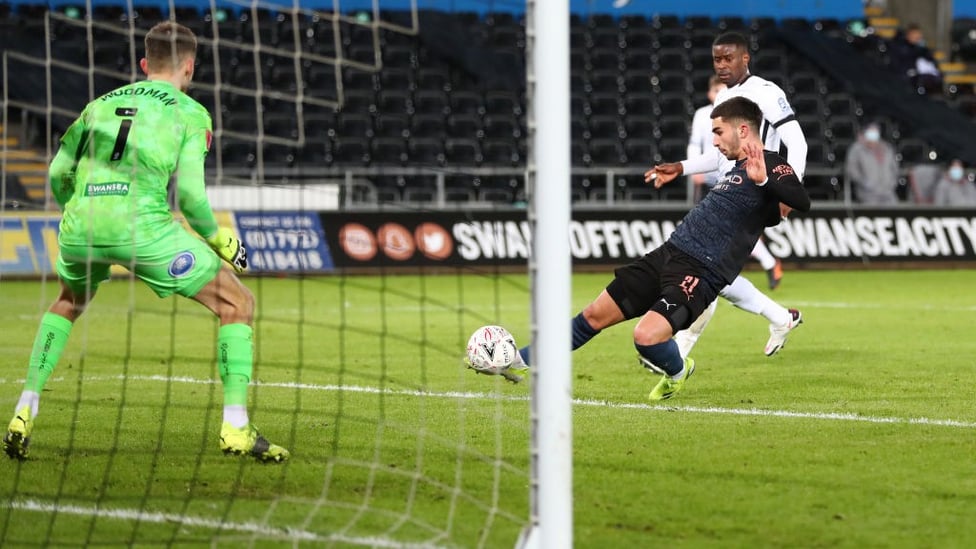 FINE MARGINS: Ferran Torres does his best to get a touch on Kyle Walker's goal