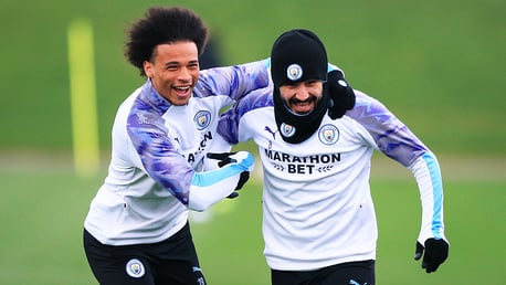 GOTCHA: Leroy Sane catches Ilkay Gundogan.