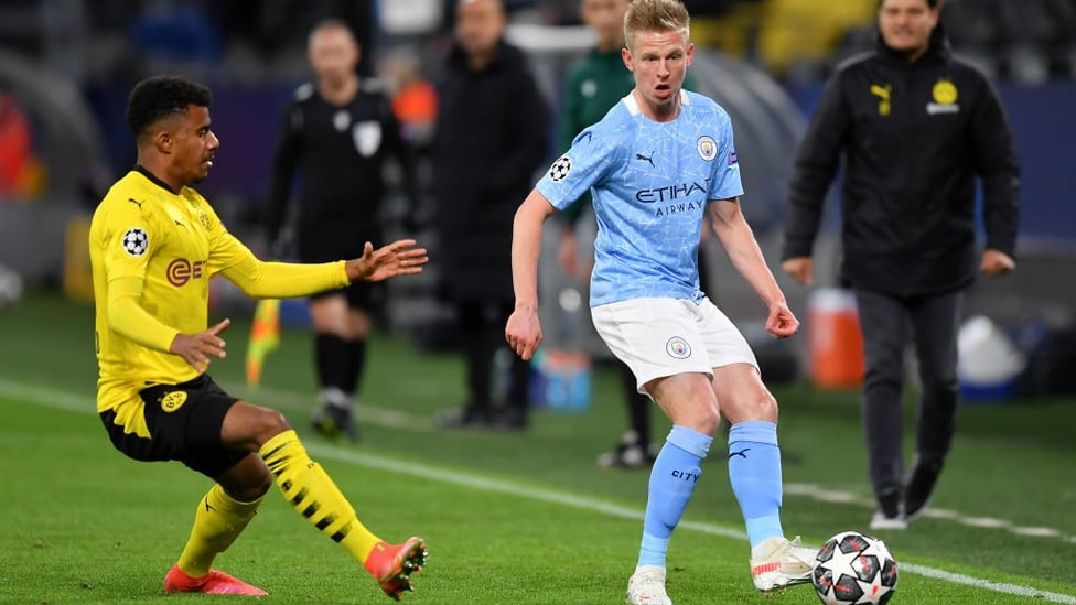 DOWN THE LINE: Oleks Zinchenko switches the play before Ansgar Knauff can pounce