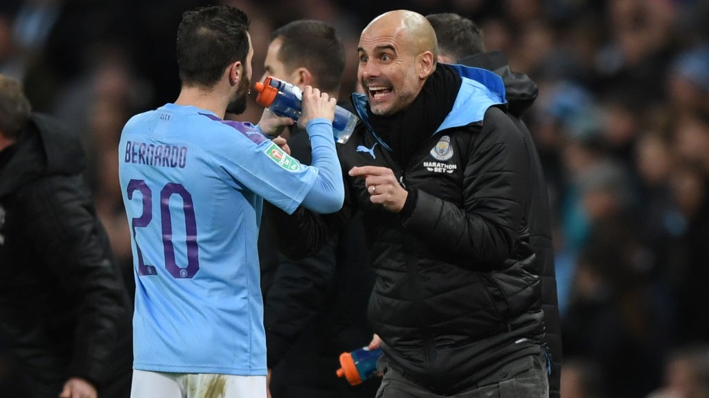 PEP TALK : Guardiola provides his instructions to Bernardo.