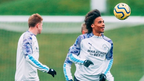 HEAD BOY: Leroy Sane hunts down the ball