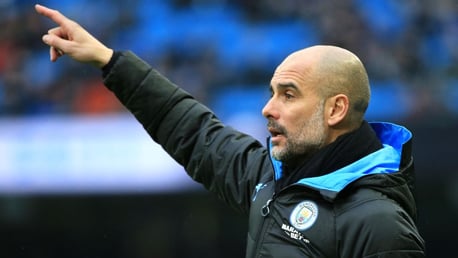 PEP TALK: Guardiola points out some adjustments from the sideline.
