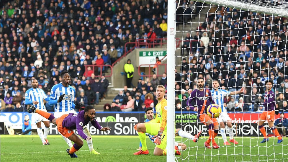 HEADS UP : Raheem Sterling swoops to head home City's second goal