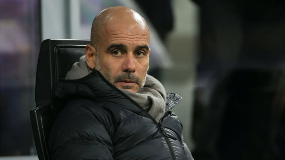WATCHING BRIEF : Pep Guardiola looks on as the action gets underway at the San Siro