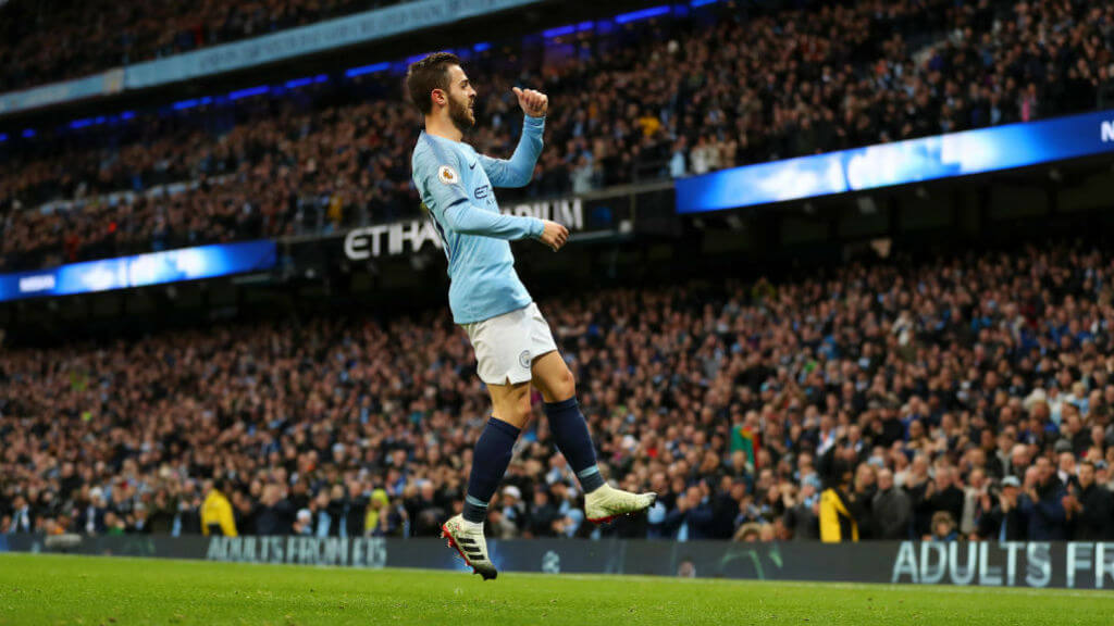 SILVA SHINES : Bernardo celebrates putting City 1-0 with a close-range strike