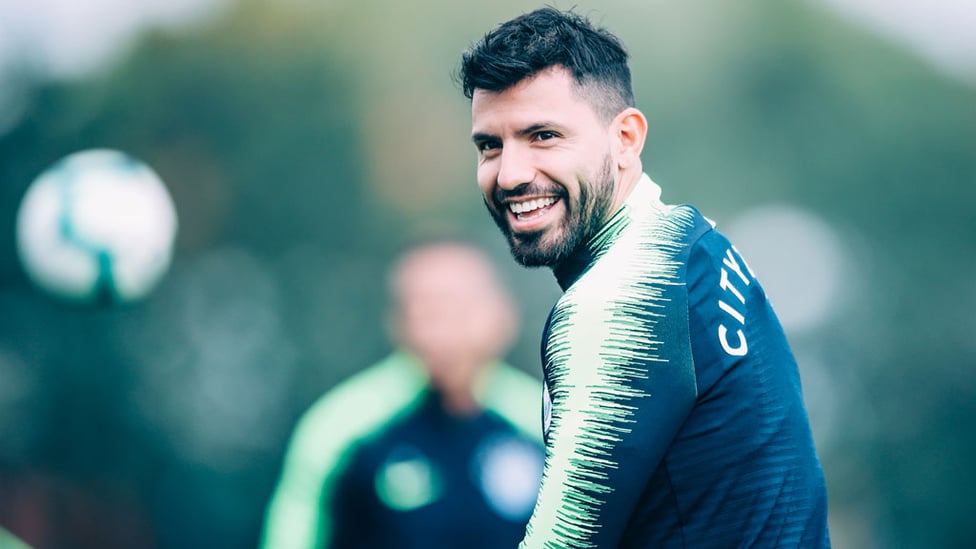 BEAMING : Sergio Aguero was all smiles in this morning's session.