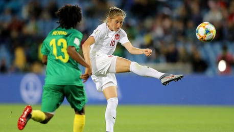 ACTION SHOT: Janine Beckie hits a half-volley against Cameroon in Canada's Group E opener