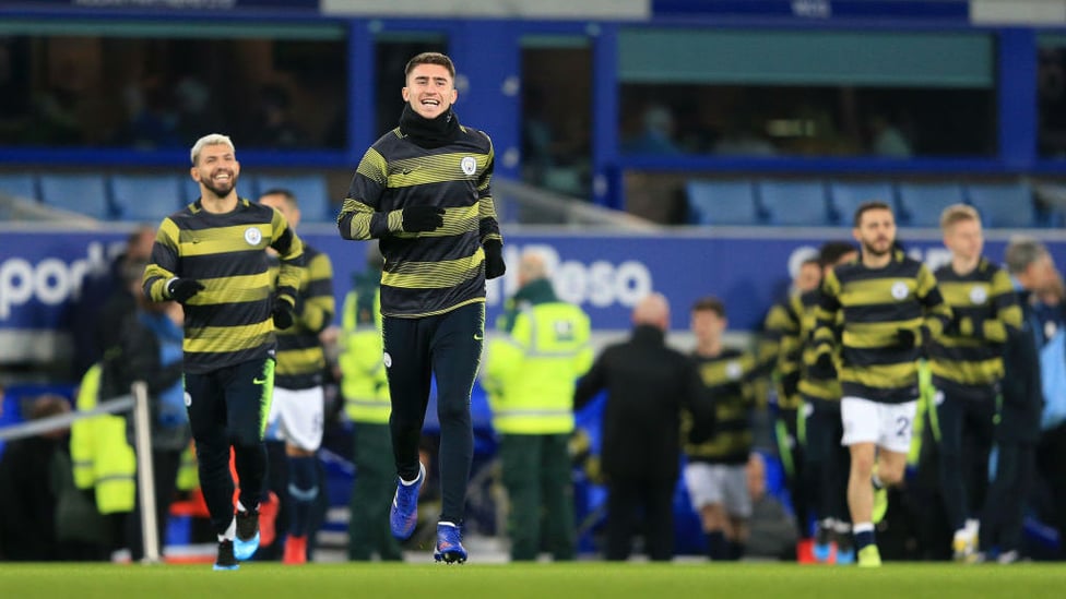 READY AND RARING : The lads warm up ahead of kick off