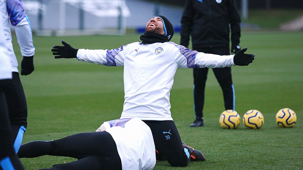 AT ARMS LENGTH : Nico joins in the fun and games in a lighthearted moment during Thursday's training session