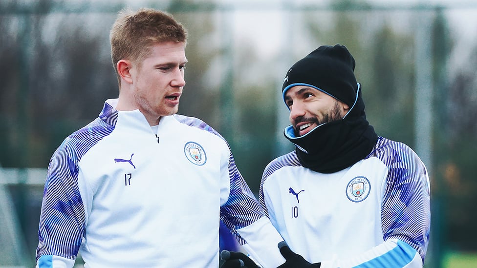 HATS THE WAY TO DO IT : Sergio Aguero takes time out to chat with Kevin De Bruyne