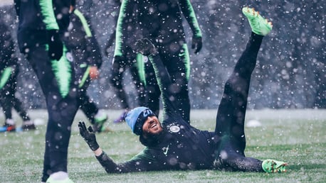 WHITE OUT: Bernardo Silva takes a tumble on the snowy surface!