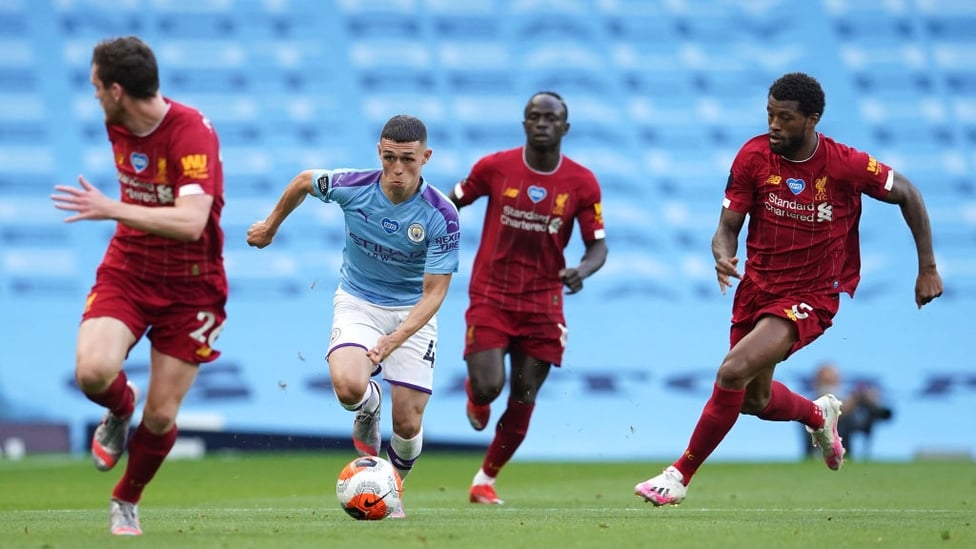 FO-RUN : The lively Foden leads an early City attack.