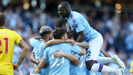 SUNSHINE BOYS: The City players celebrate after Mahrez's strike