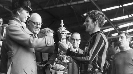 UNFORGETTABLE: A proud Manchester City skipper Tony Book receives the FA Cup from Princess Anne at Wembley after our 1969 final triumph over Leicester City